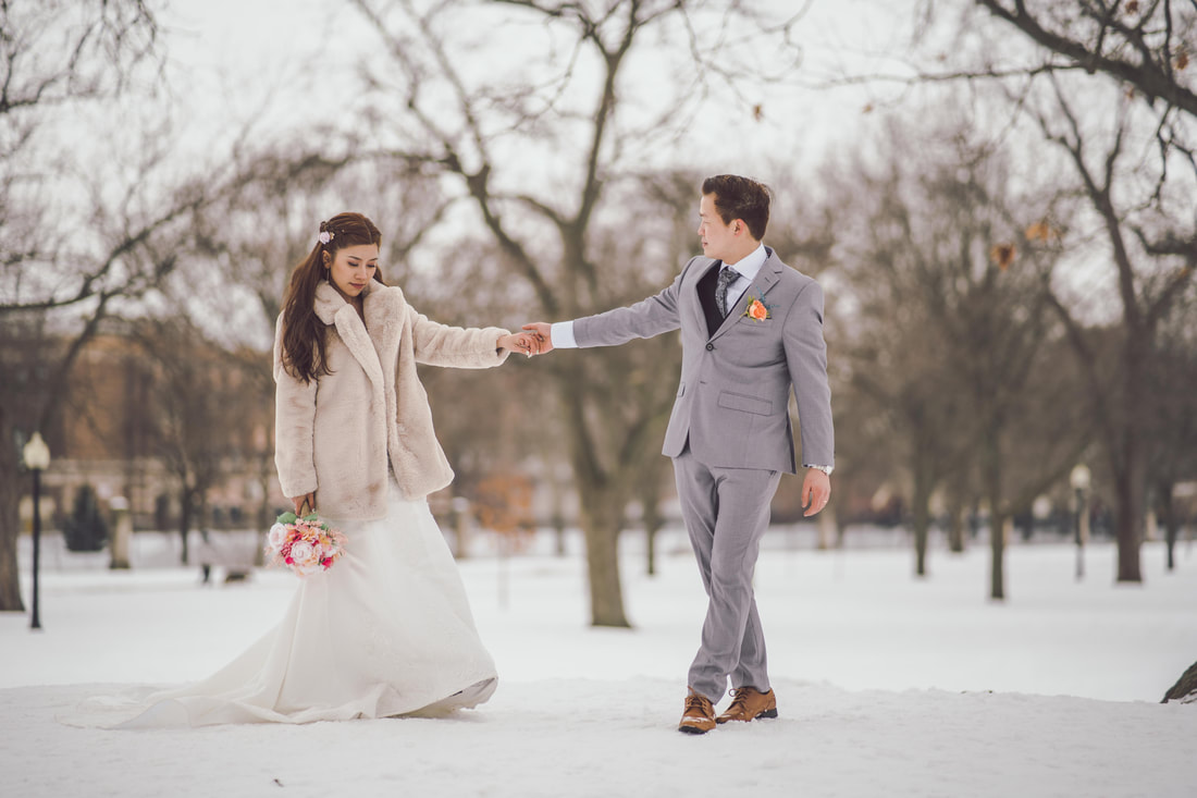 Winter wedding with groom leading bride at willistead Manor in windsor